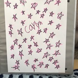 Piece of paper and made by hand name vaults pink stars.